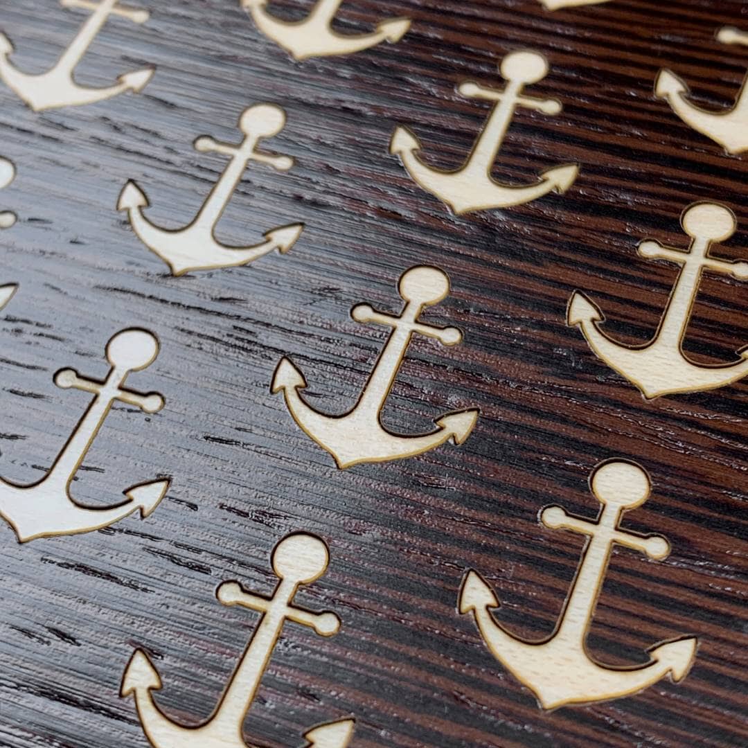Zoomed in detailed shot of the Anchor Case featuring a Maple and Wenge Wood backer