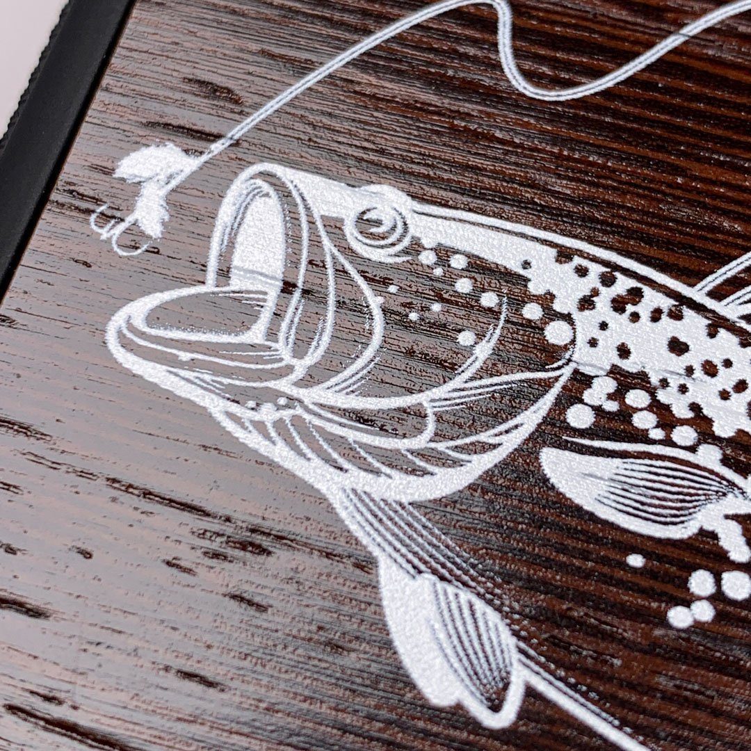Zoomed in detailed shot of the Angler case featuring UV printed spotted bass on Wenge wood