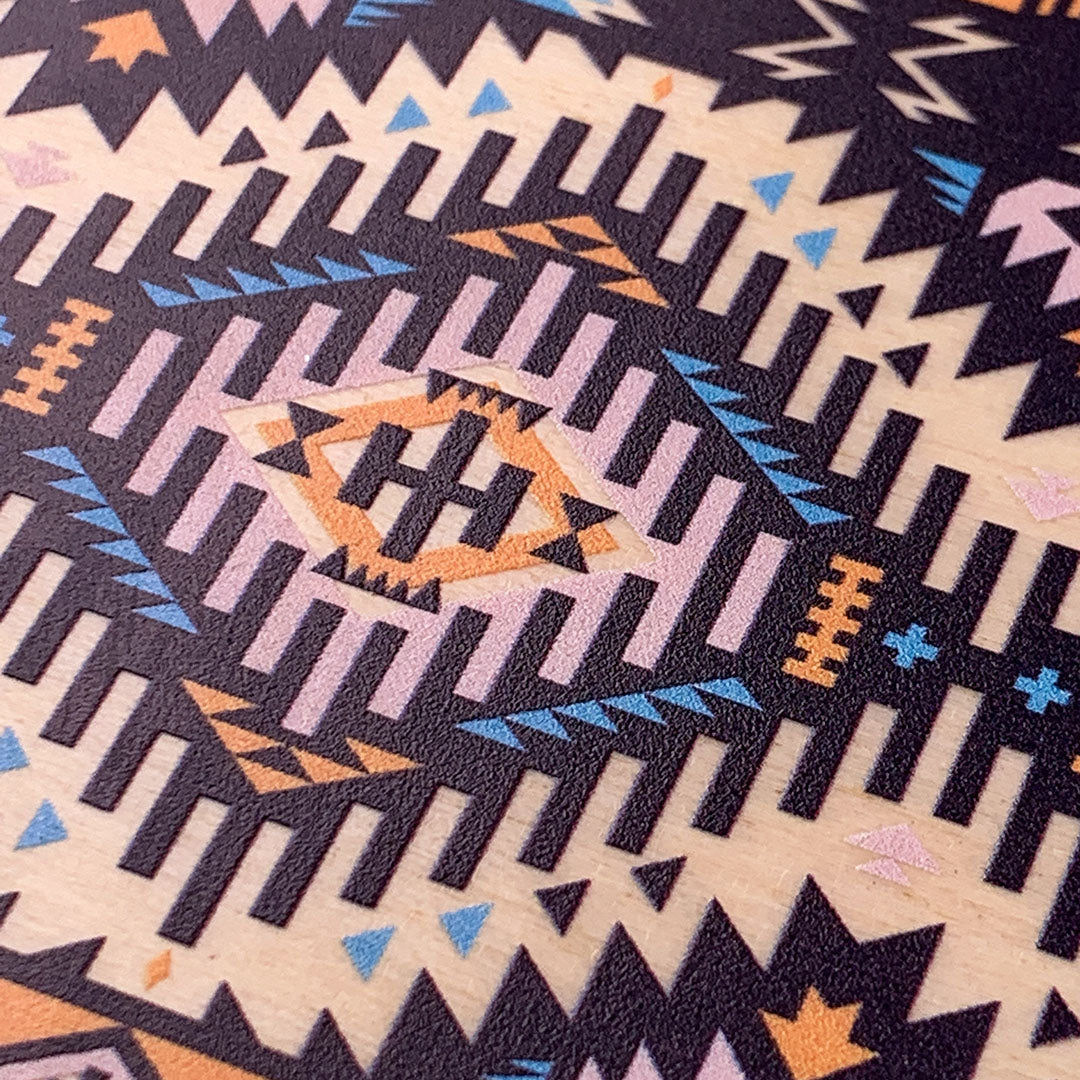 Zoomed in detailed shot of the vibrant Aztec printed pattern on Maple Wood
