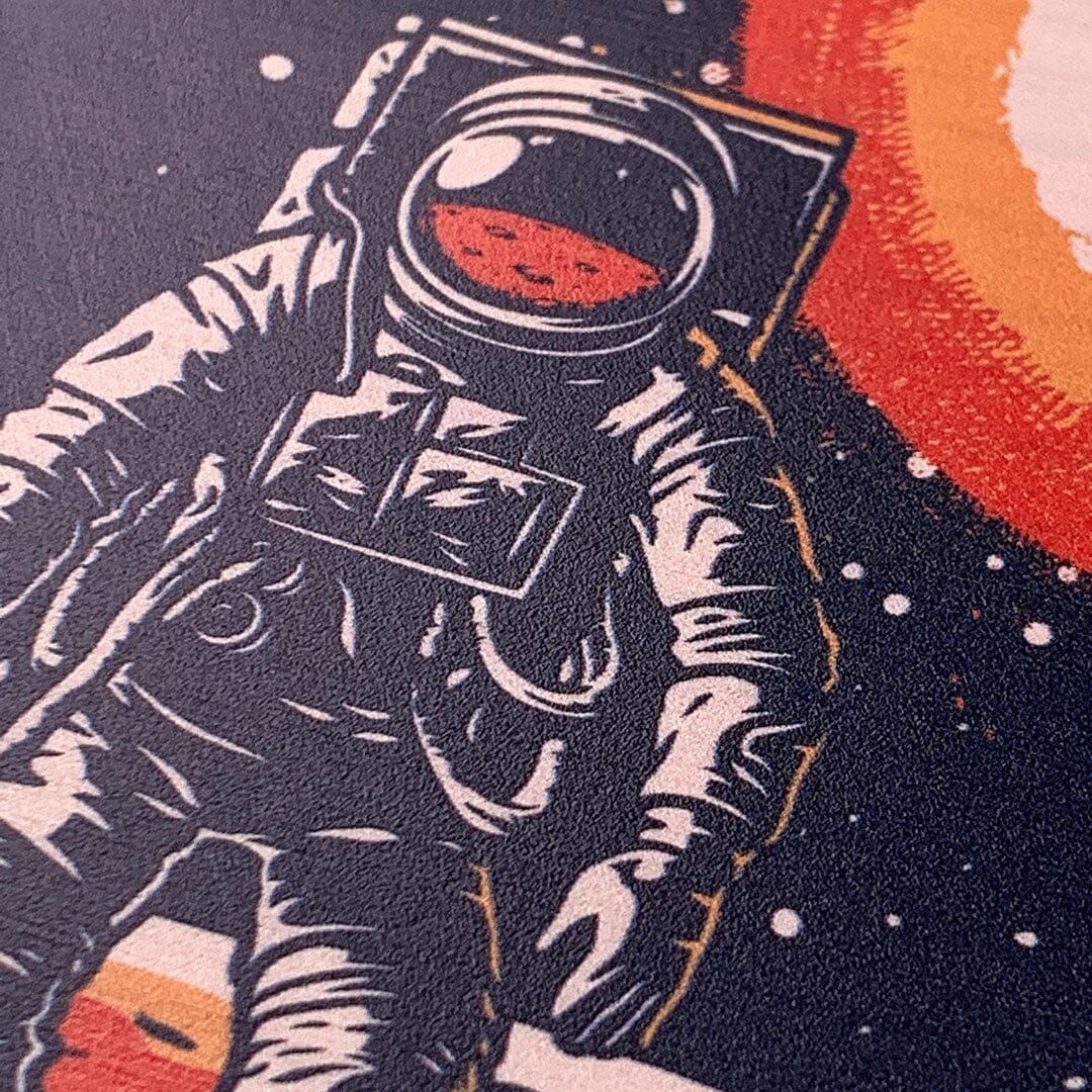 Zoomed in detailed shot of the stylized astronaut space-walk print on Cherry wood phone case by Keyway
