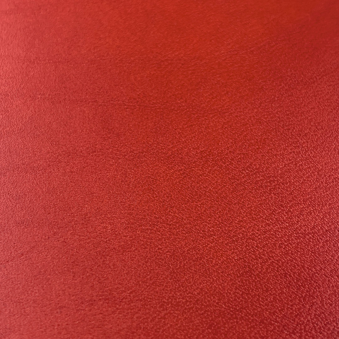 Zoomed detail shot of the grain on the Crimson leather phone case by Keyway
