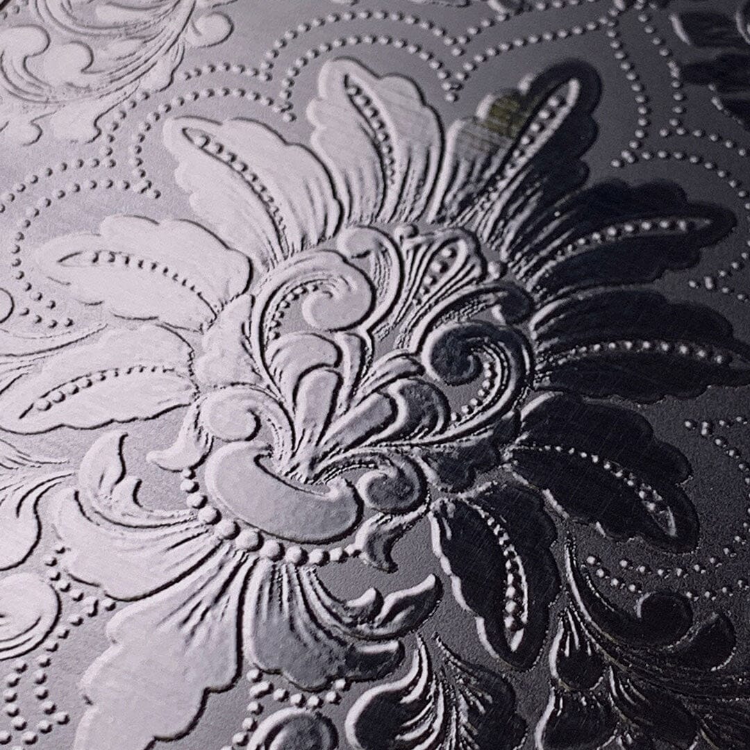 Zoomed in detailed shot of the detailed gloss Damask pattern printed on matte black impact acrylic phone case by Keyway