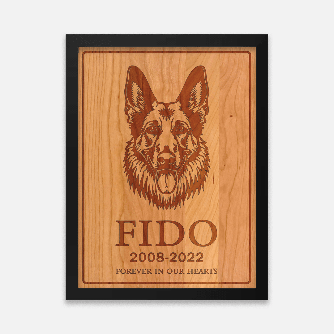 Framed laser-engraved wooden wall art featuring a detailed dog portrait, personalized with the pet’s name, life dates, and a custom message. Crafted on natural Cherry wood, this minimalist design highlights the wood’s rich grain while offering a heartfelt tribute—perfect for home décor or as a meaningful gift for dog lovers.