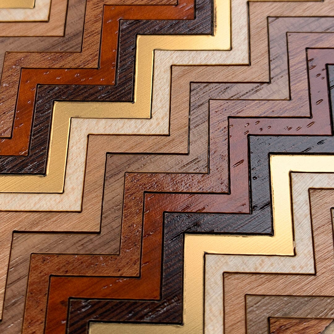 Zoomed in detailed shot of the Echo case featuring a tight pattern of Walnut, Wenge, Maple, and Padauk wood