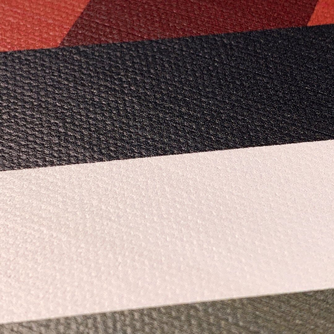 Zoomed details of the white, black, red and green lines on the Highland printed cotton canvas case by Keyway
