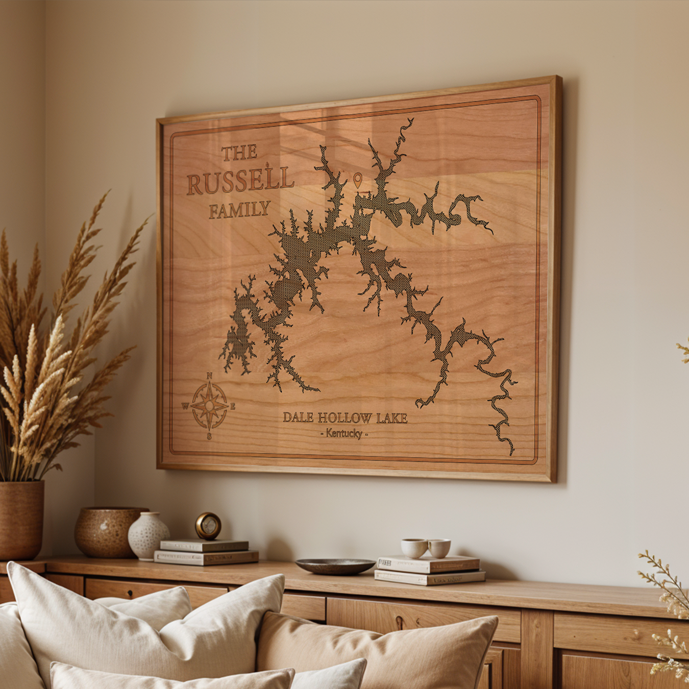 Personalized wood wall art of Dale Hollow Lake, Kentucky, engraved with 'The Russell Family' and displayed in a serene, neutral-toned living room. A handcrafted lake map that brings rustic charm and a personal touch to modern farmhouse décor.