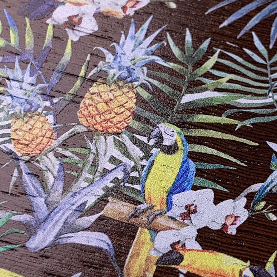 Zoomed in detail shot of the Tropic print featuring toucans macaws pineapples and leaves Wenge wood phone case by Keyway