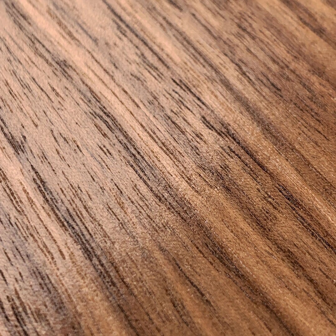 Zoomed in detail of the Walnut Pure wood grain phone case by Keyway