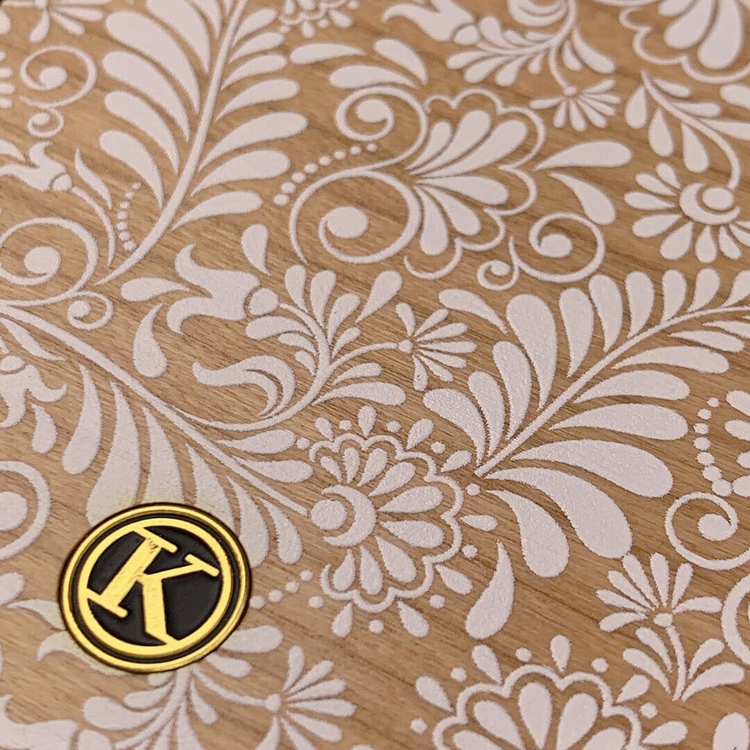 Zoomed in detailed shot of the white ink flowing botanical print on Cherry wood Galaxy S10e Case by Keyway Designs