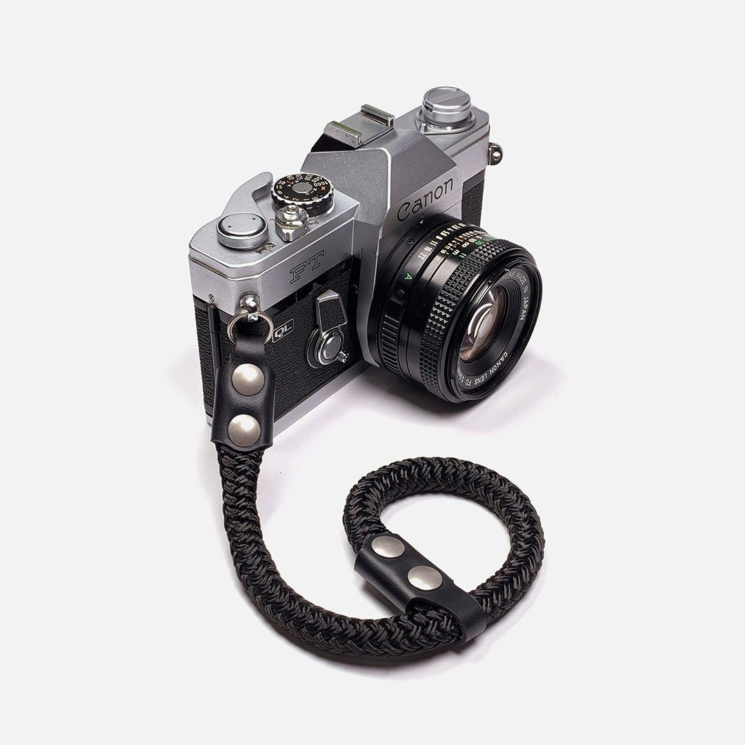 Camera Wrist Strap. Black Leather, Brass and Black Nylon. Designed and Produced in Canada by Keyway Designs.