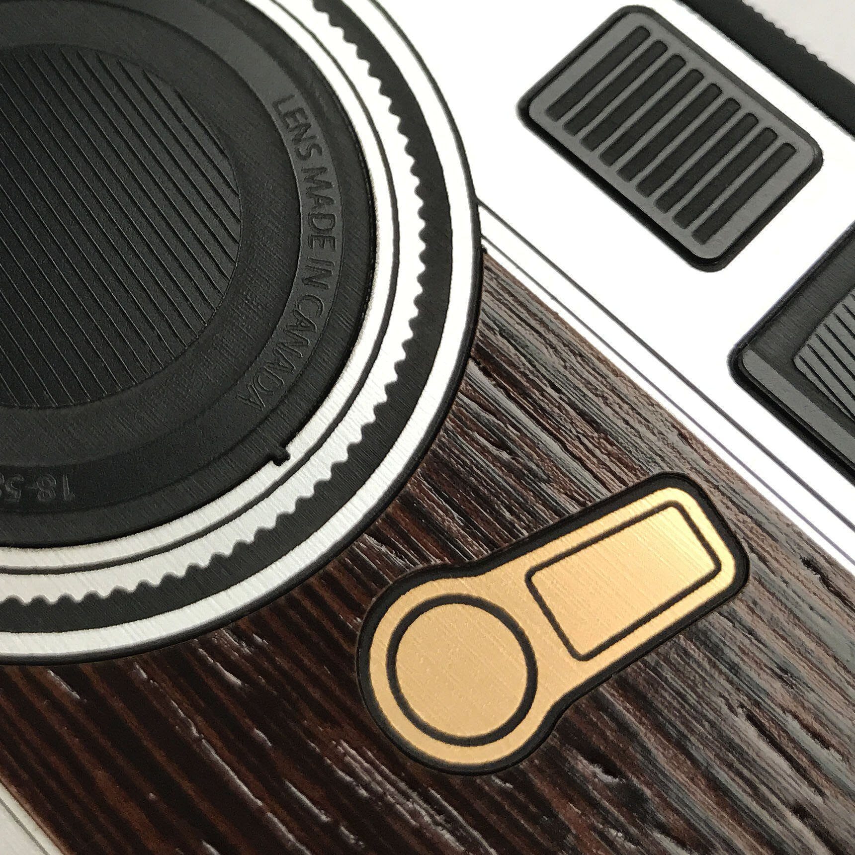 Zoomed in detailed shot of the classic Camera, silver metallic and wood iPhone 15 Plus MagSafe Case by Keyway Designs