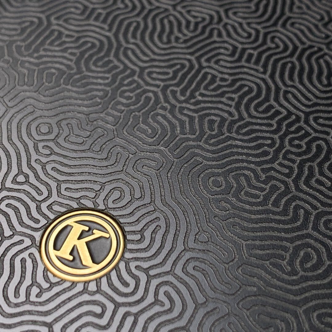 Zoomed in detailed shot of the highly detailed organic growth engraving on matte black impact acrylic Galaxy S21 Case by Keyway Designs