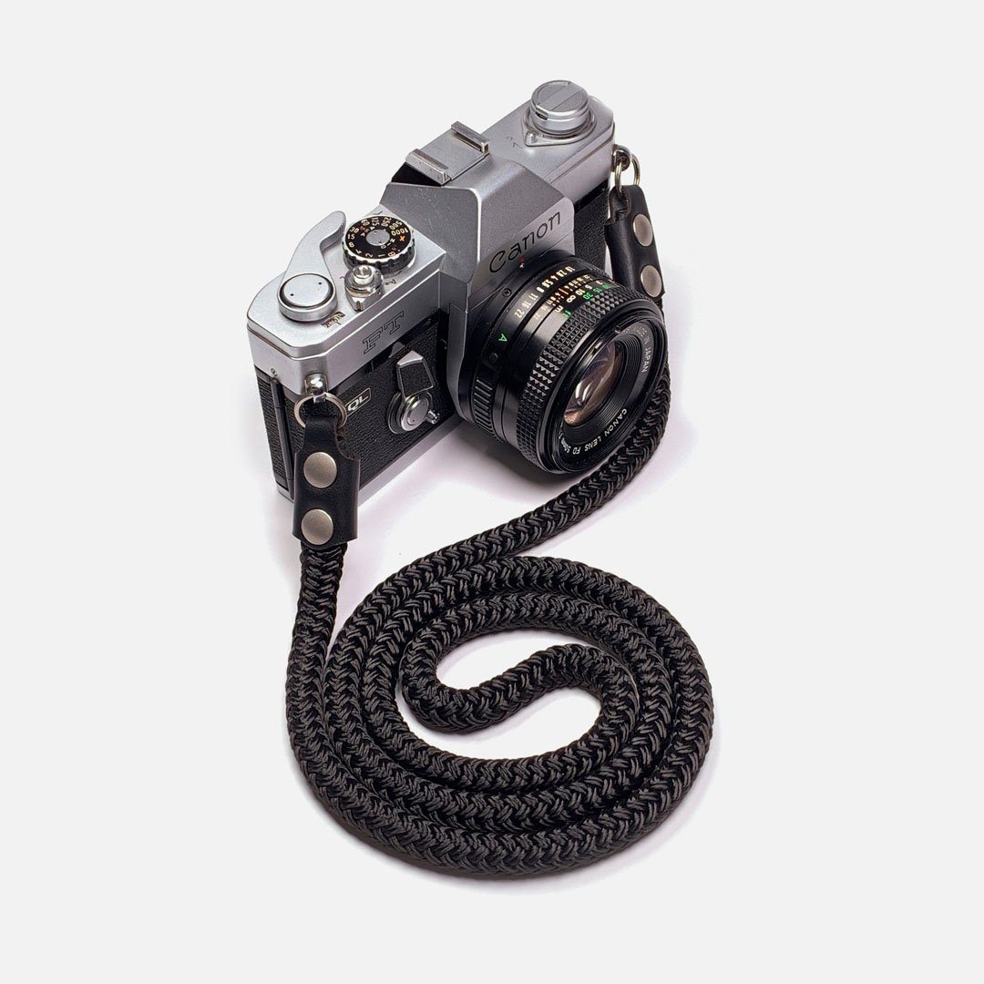 Camera Neck Strap. Black Leather, Brass and Black Nylon. Designed and Produced in Canada by Keyway Designs.