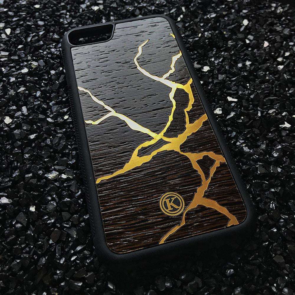 Zoomed in detailed shot of the Kintsugi inspired Gold and Wenge Wood iPhone 7/8 Case by Keyway Designs