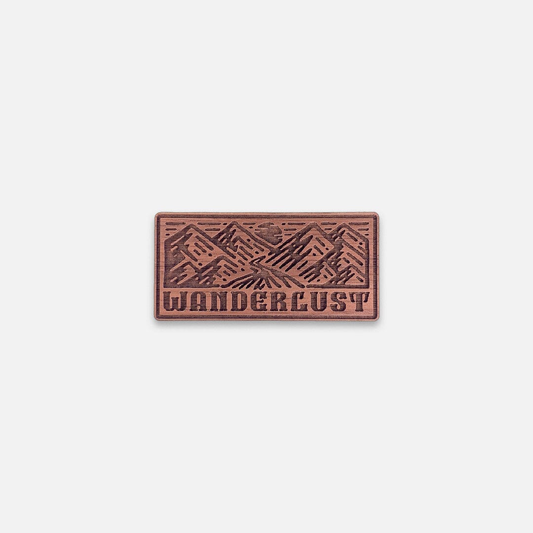 Wanderlust - Keyway Engraved Wooden Pin in Walnut, Front View