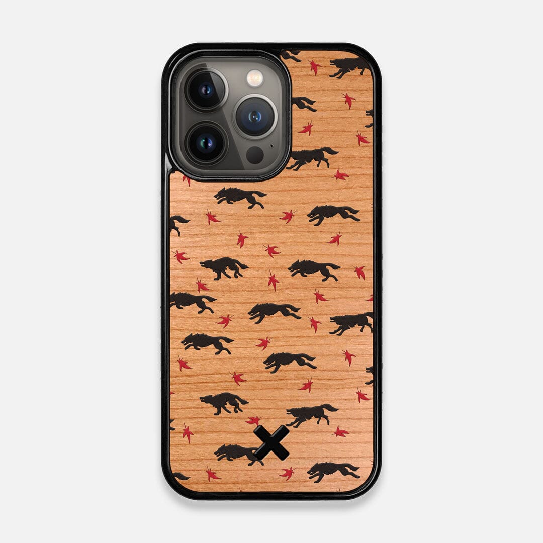 Front view of the unique pattern of wolves and Maple leaves printed on Cherry wood iPhone 13 Pro Case by Keyway Designs