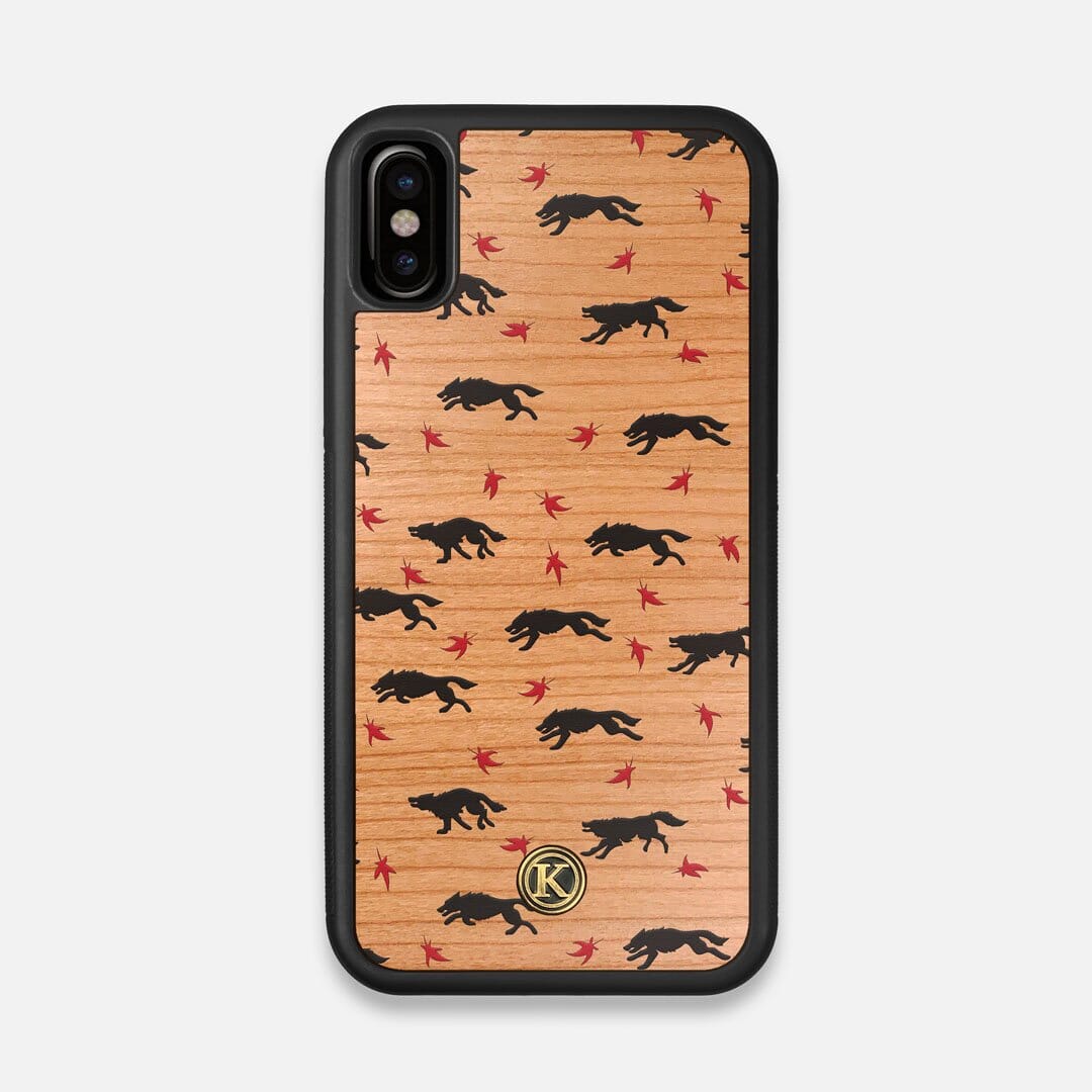 Front view of the unique pattern of wolves and Maple leaves printed on Cherry wood iPhone X Case by Keyway Designs