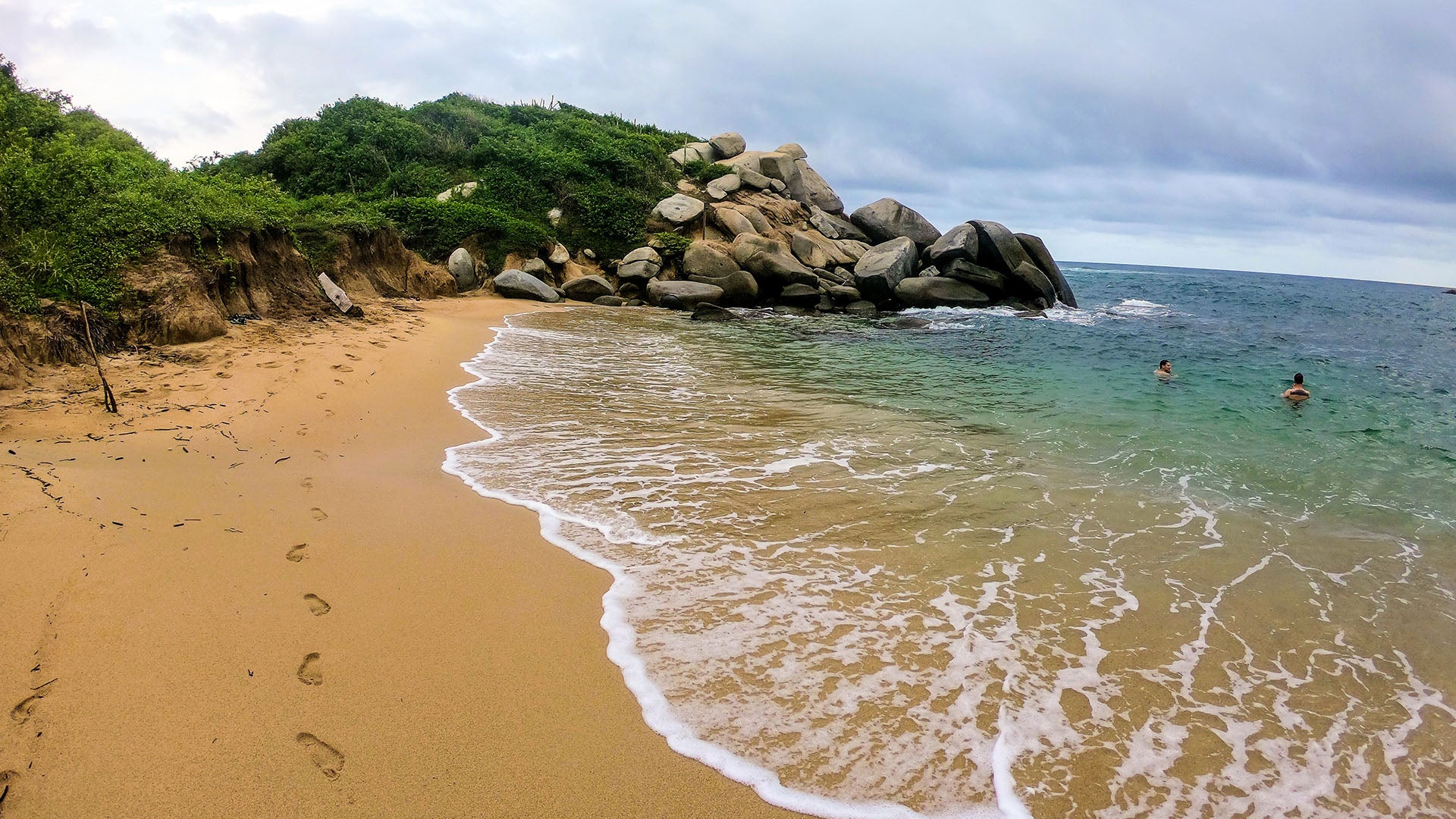 Relaxing at Cabo San Juan in Tayrona National Park, Colombia after our muddy jungle trek. Meg Atteberry