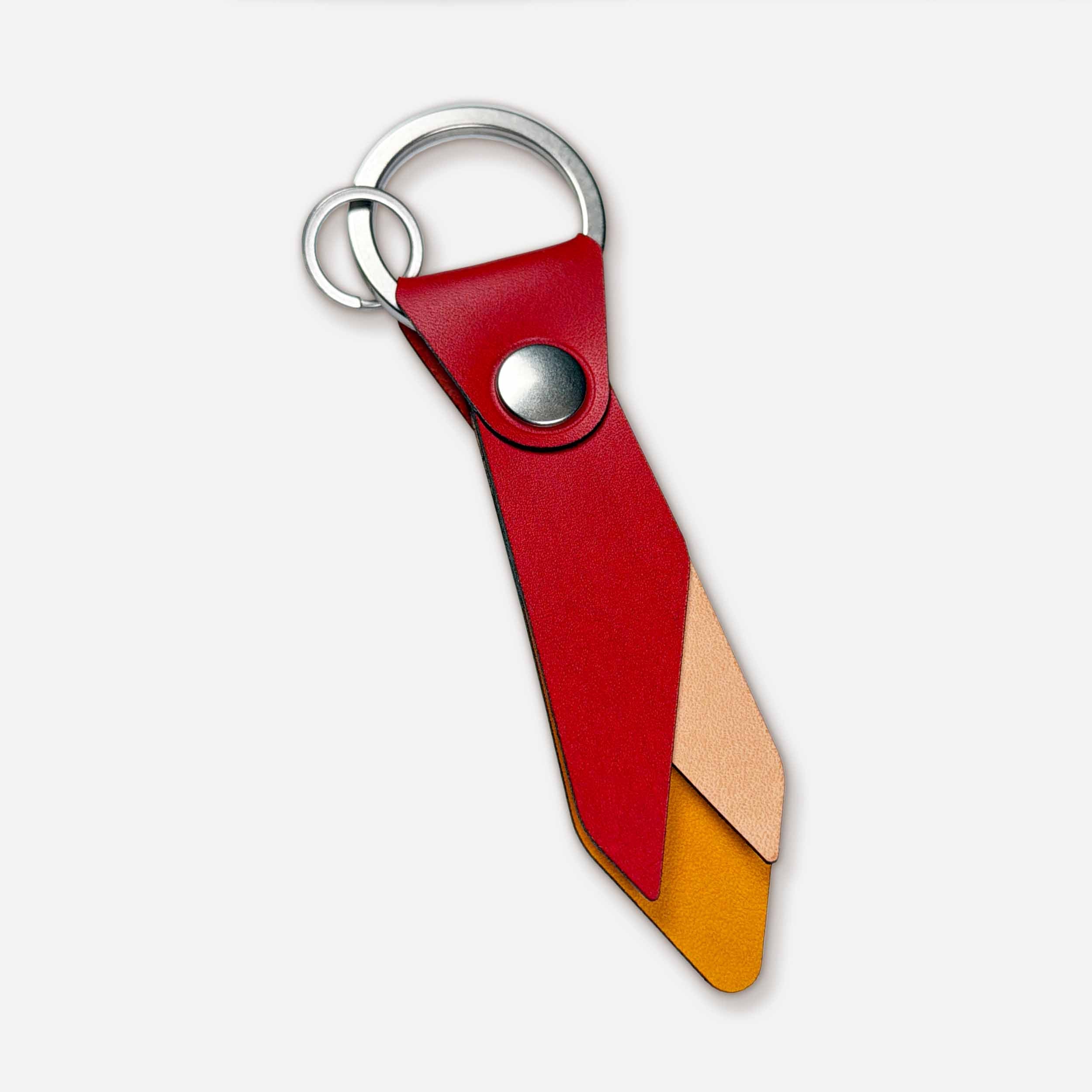 Keyway Ember handmade leather keychain — red Italian full-grain veg-tan with nickel hardware and flame design