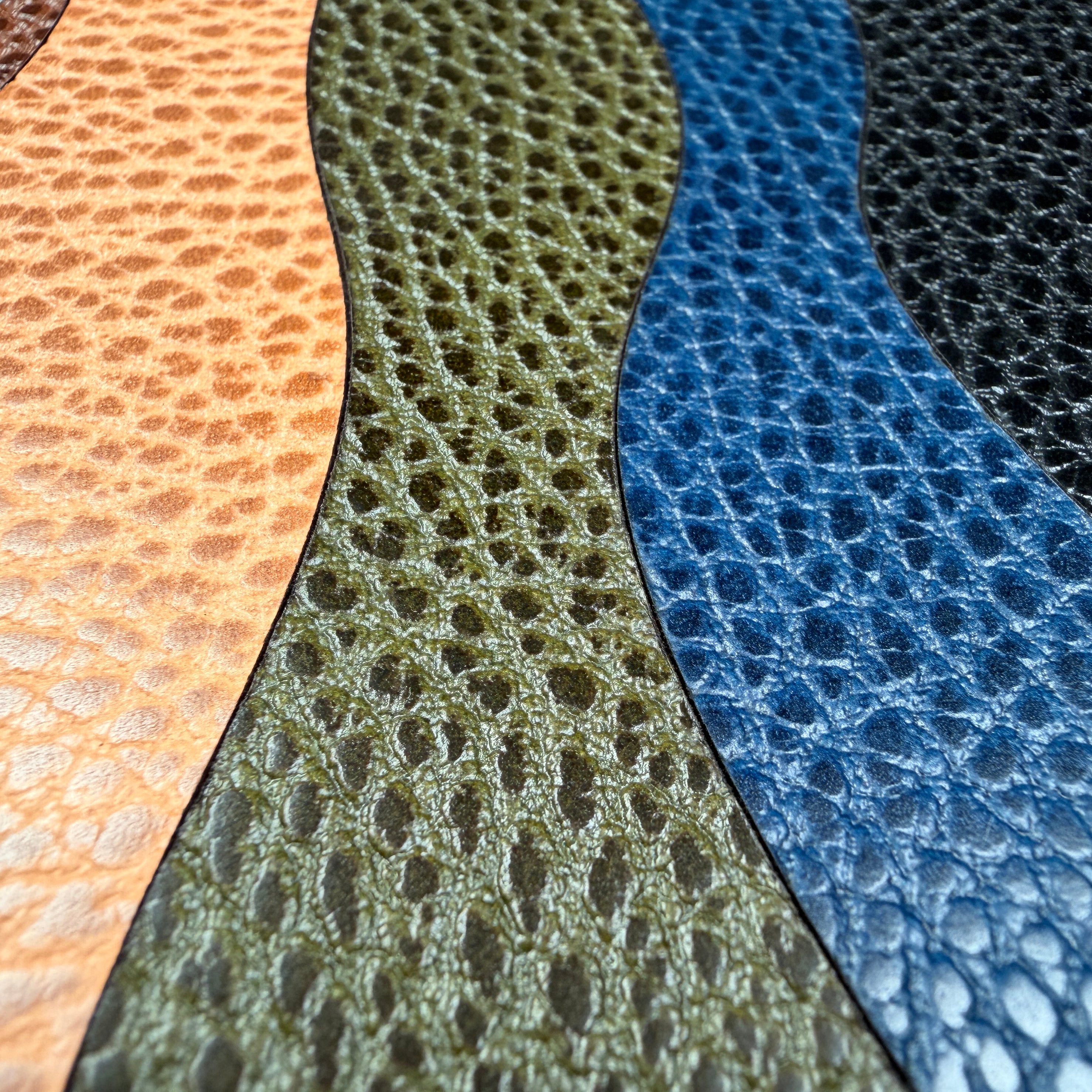 Zoomed detail shot of the grain on the Sable leather phone case by Keyway