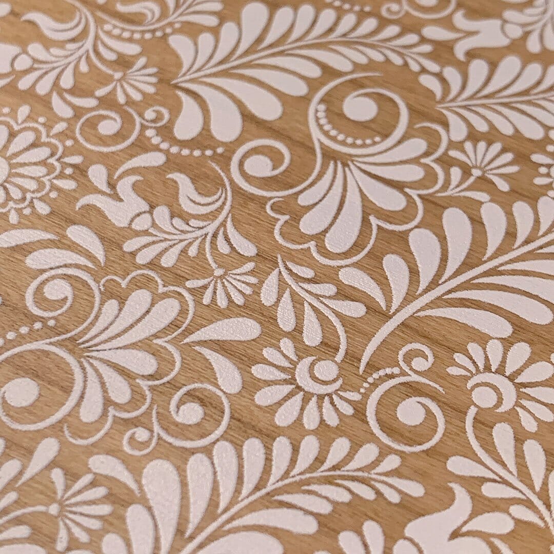 Zoomed in detailed shot of the white ink flowing botanical print on Cherry wood Galaxy Note 10 Plus Case by Keyway Designs