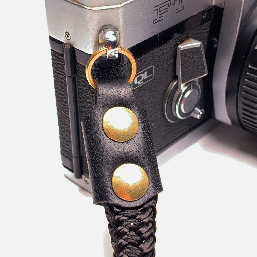 Camera Neck Strap. Black Leather, Brass and Black Nylon. Precision cut leather and solid brass hardware.