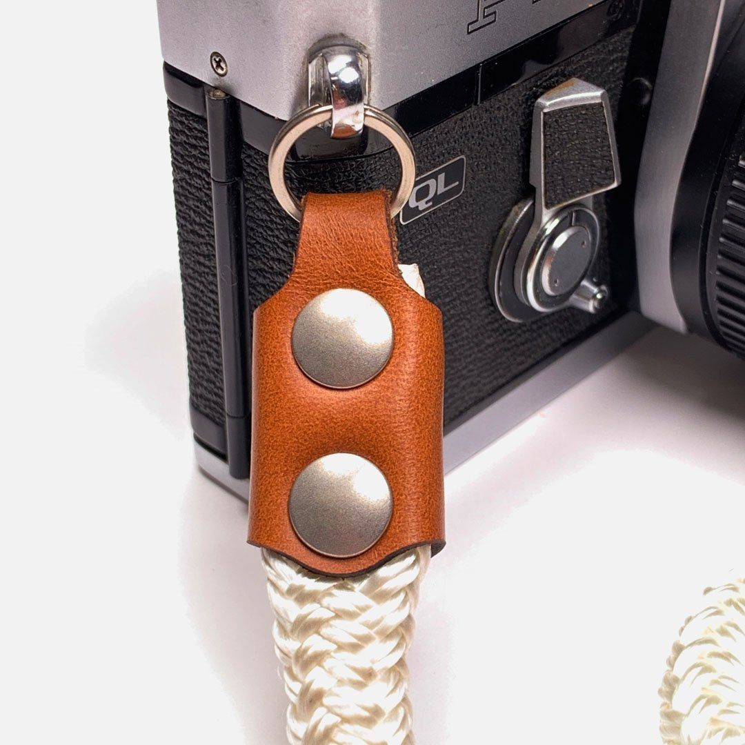 Camera Wrist Strap. Leather, Brass and Nylon. Precision cut leather fixtures and Solid Brass & Iron hardware.