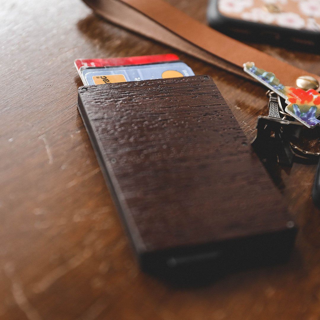 Wenge Wood & Aluminum Card Holder on Desk