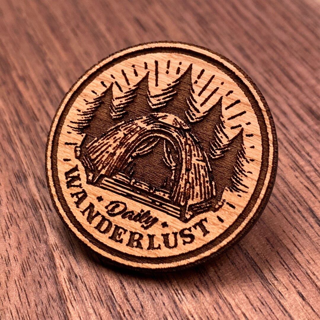 Daily Wanderlust - Keyway Engraved Wooden Pin in Cherry, Zoomed in View