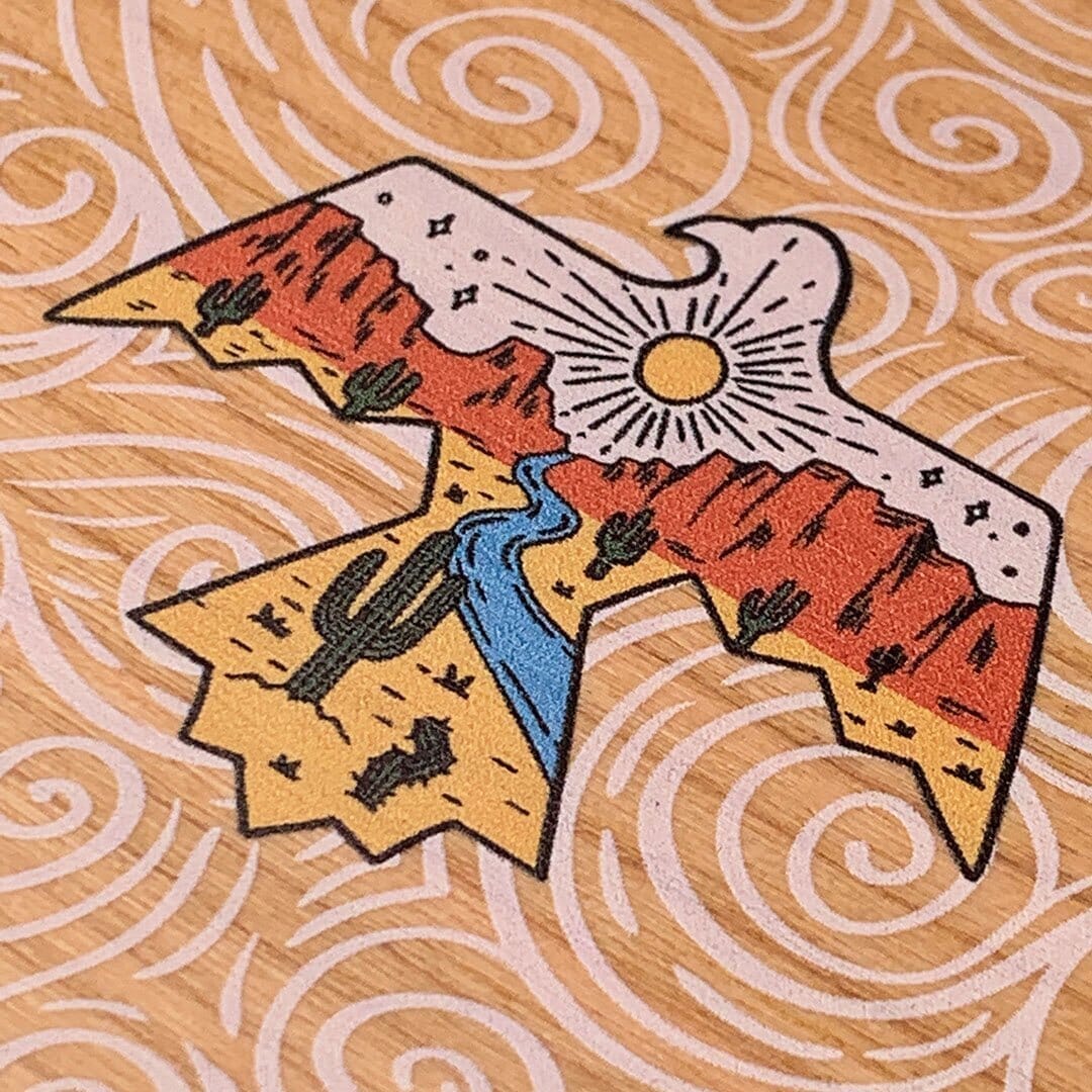 Zoomed in detailed shot of the double-exposure style eagle over flowing gusts of wind printed on Cherry wood iPhone 15 MagSafe Case by Keyway Designs
