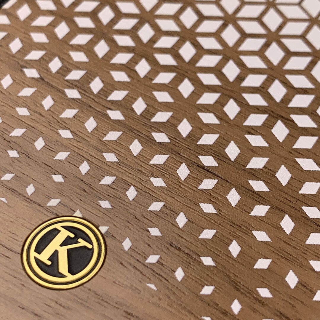Zoomed in detailed shot of the white ink geometric gradient printed on Walnut wood iPhone X Case by Keyway Designs