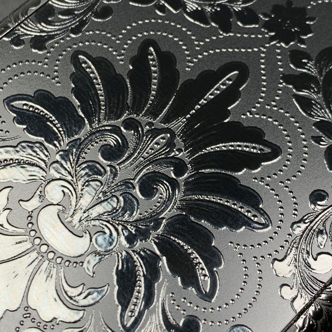 Zoomed in detailed shot of the detailed gloss Damask pattern printed on matte black impact acrylic iPhone XR Case by Keyway Designs