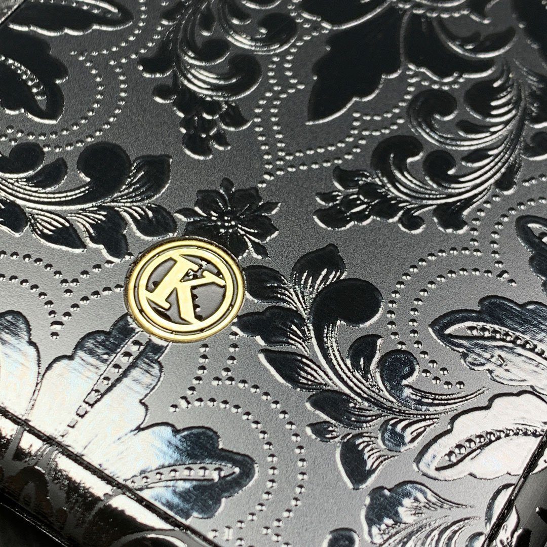 Zoomed in detailed shot of the detailed gloss Damask pattern printed on matte black impact acrylic iPhone 11 Pro Case by Keyway Designs