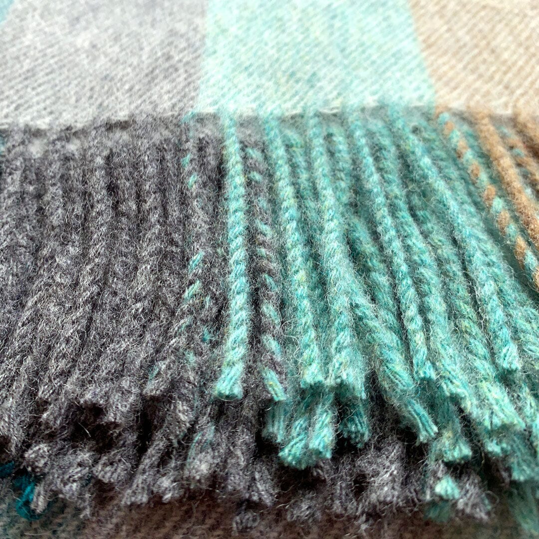 KEYWAY | Merino Camp Blanket in the Eucalyptus Colourway Tassle Details