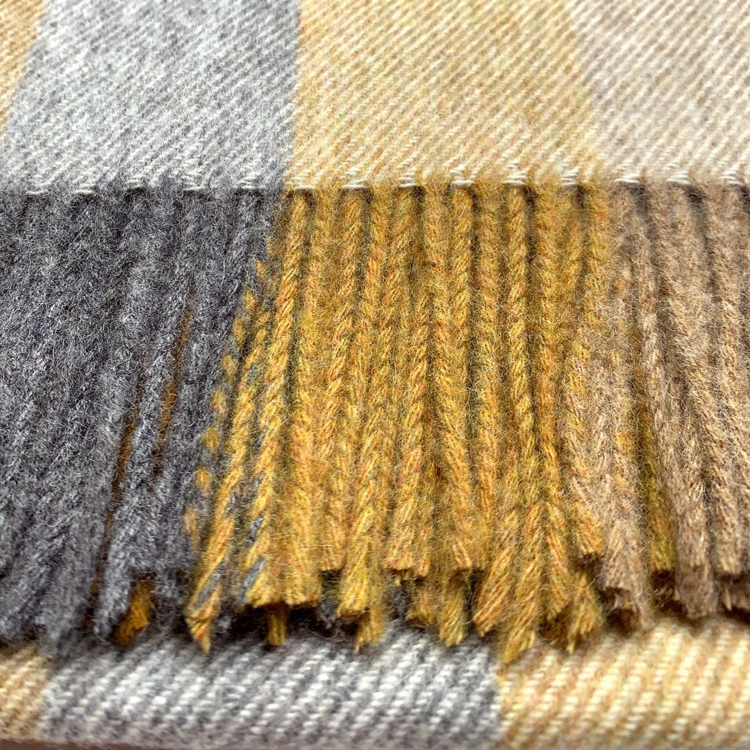 KEYWAY | Merino Camp Blanket in the Gold Colourway Tassle Details