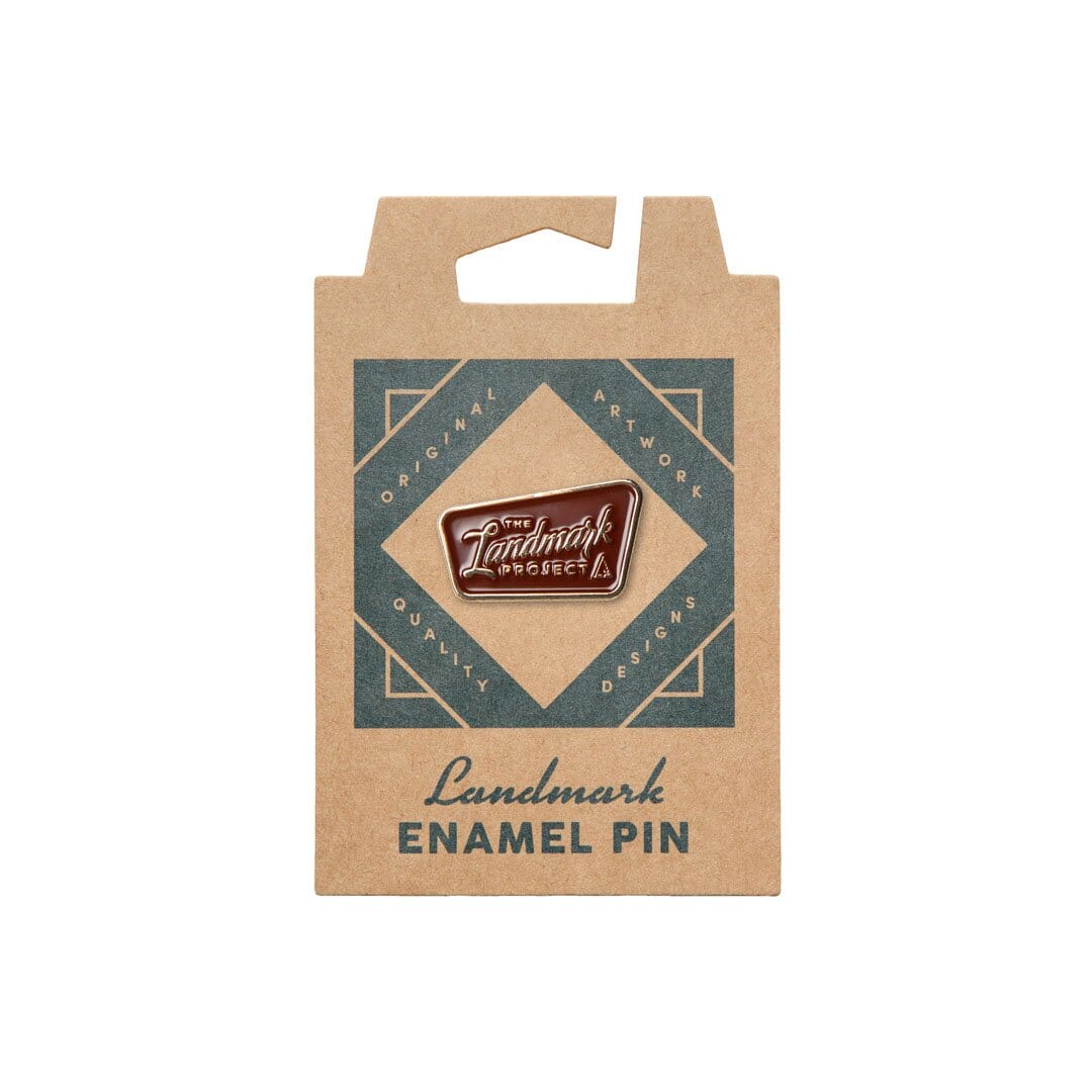 Trail Sign Enamel Pin by The Landmark Project, Front Packaging View