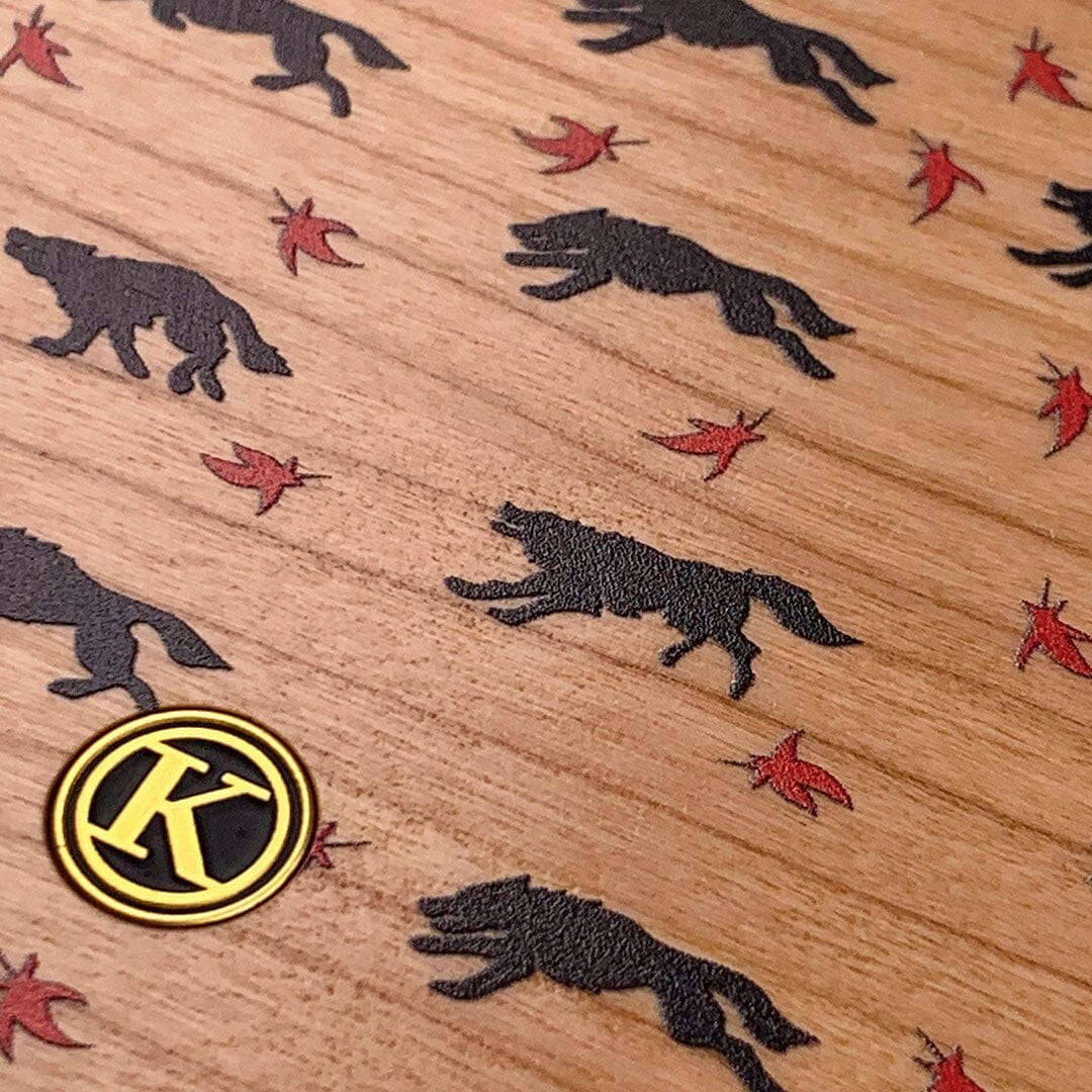 Zoomed in detailed shot of the unique pattern of wolves and Maple leaves printed on Cherry wood Galaxy Note 10 Plus Case by Keyway Designs