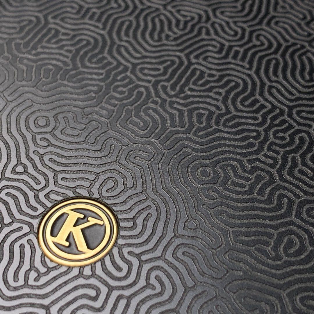 Zoomed in detailed shot of the highly detailed organic growth engraving on matte black impact acrylic Galaxy S21 Ultra Case by Keyway Designs