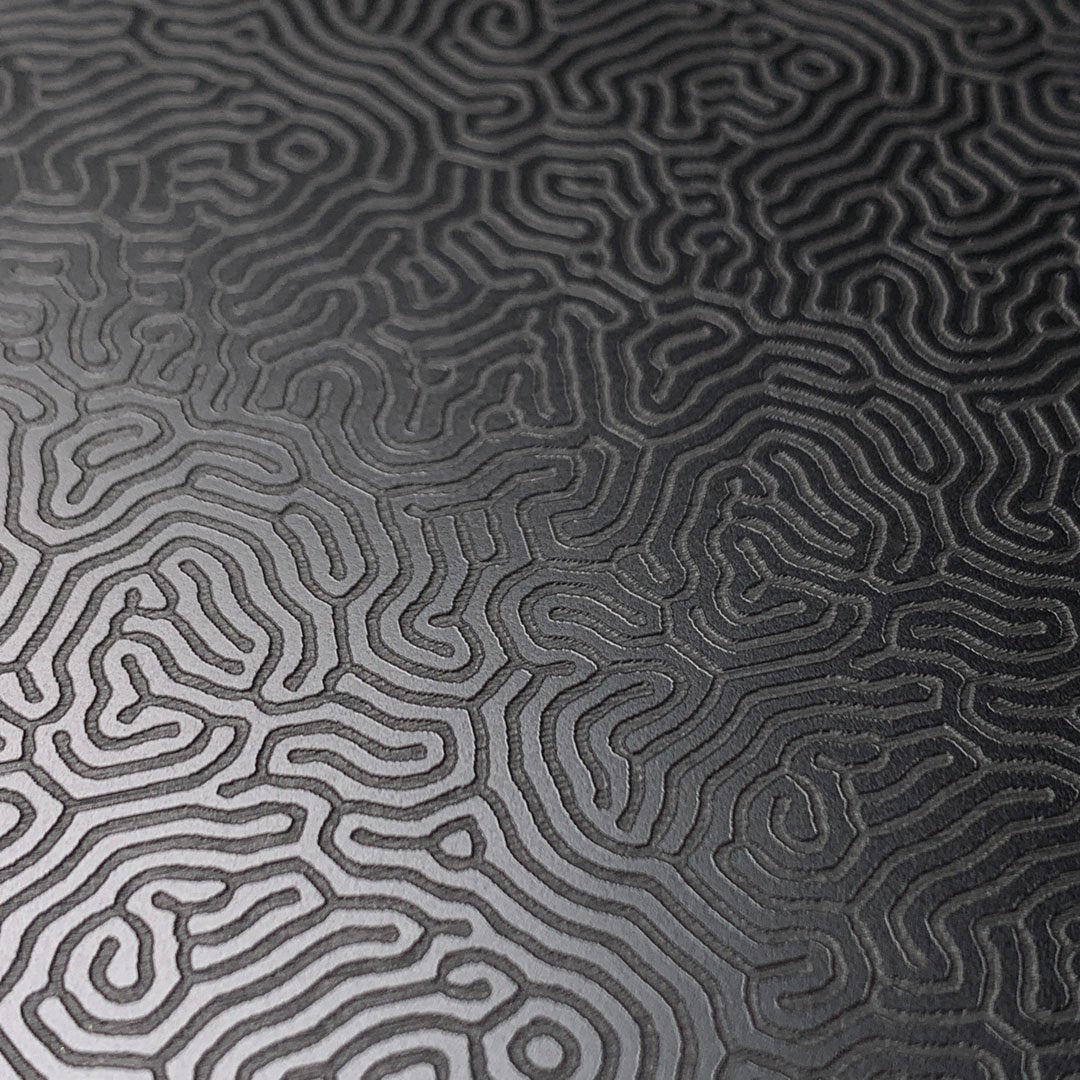 Zoomed in detailed shot of the highly detailed organic growth engraving on matte black impact acrylic Galaxy S20 Case by Keyway Designs