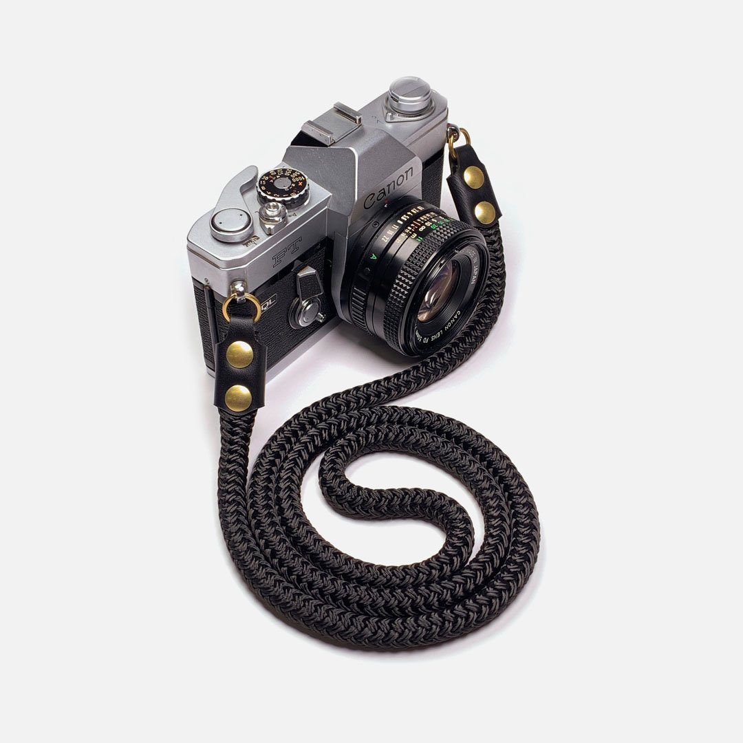 Camera Neck Strap. Black Leather, Brass and Black Nylon. Designed and Produced in Canada by Keyway Designs.