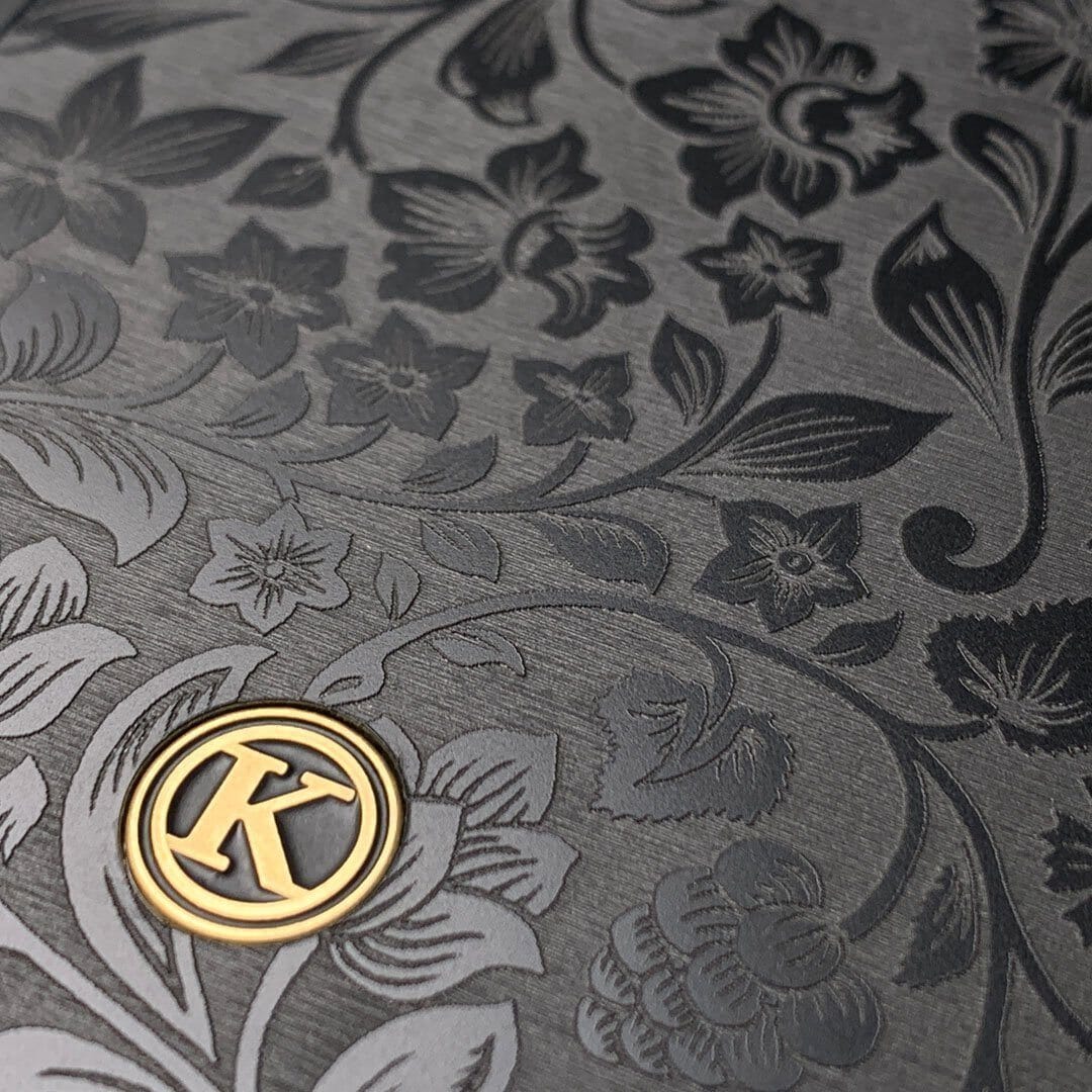 Zoomed in detailed shot of the highly detailed midnight floral engraving on matte black impact acrylic Galaxy S21 Case by Keyway Designs