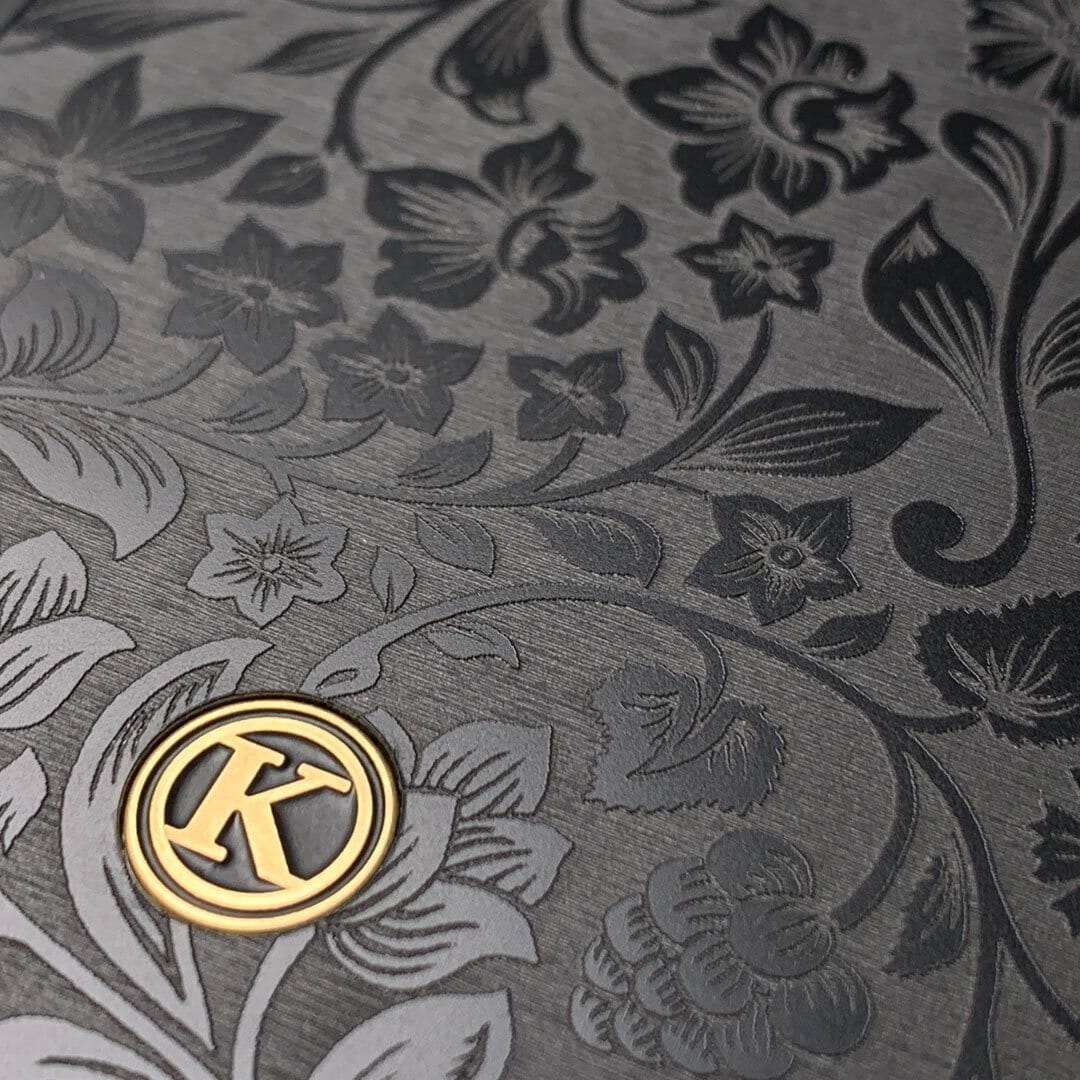 Zoomed in detailed shot of the highly detailed midnight floral engraving on matte black impact acrylic Galaxy S21 Ultra Case by Keyway Designs