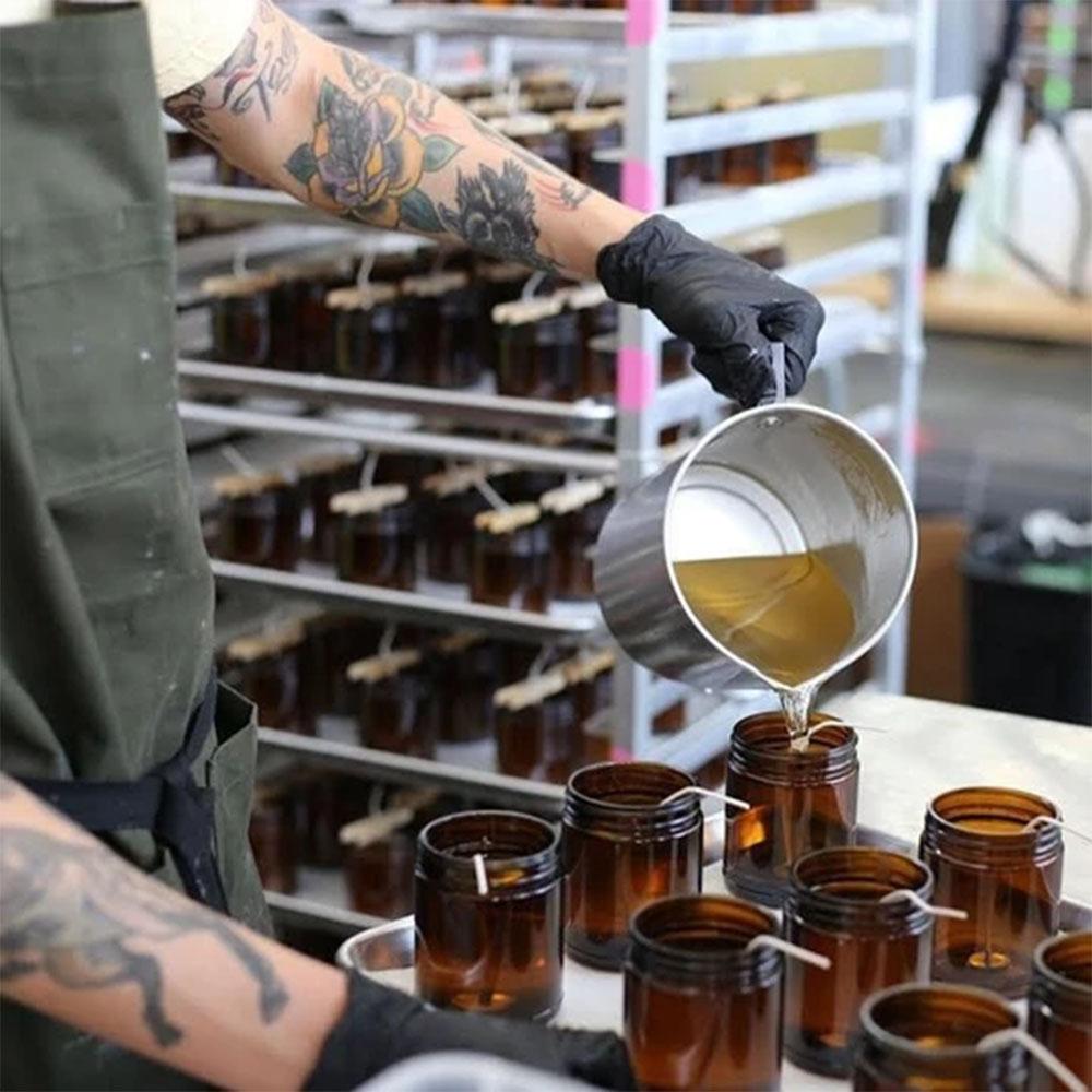 Sandlewood Rose candles being made.