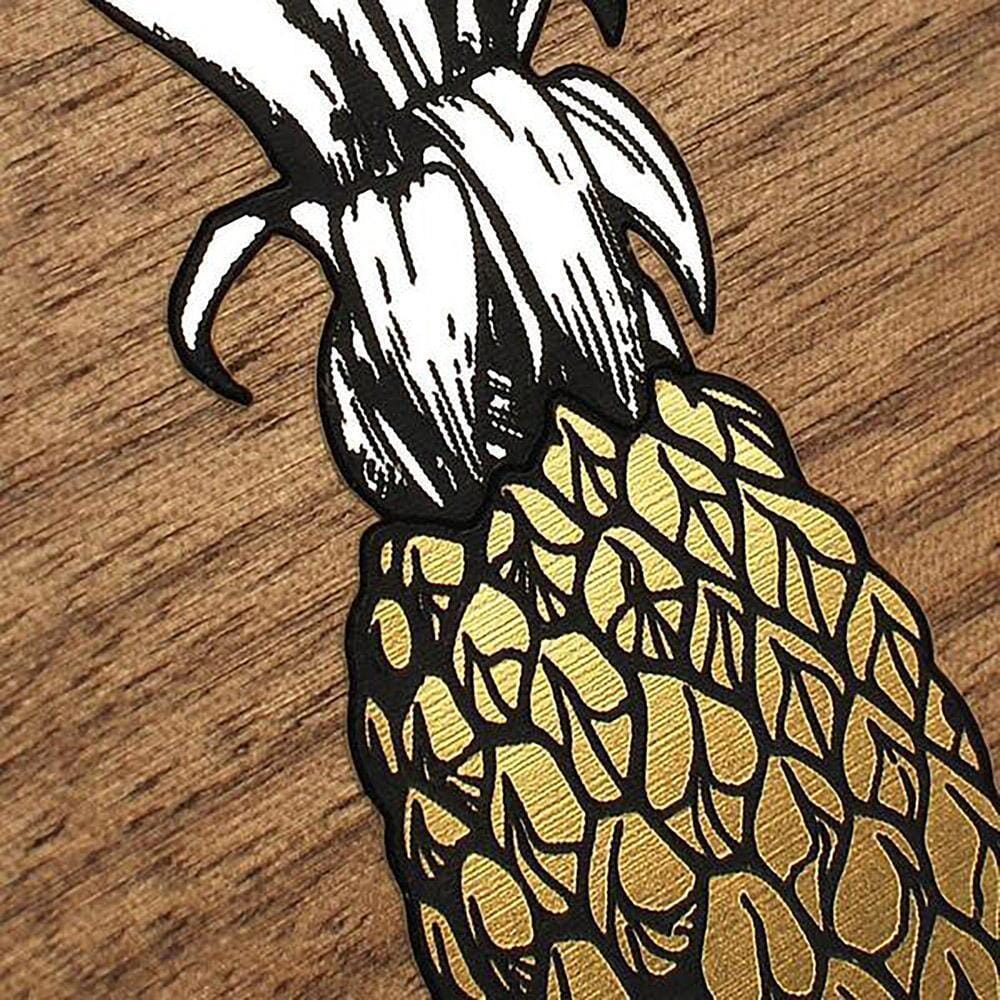 Zoomed in detailed shot of the Pineapple Walnut Wood iPhone 13 Case by Keyway Designs