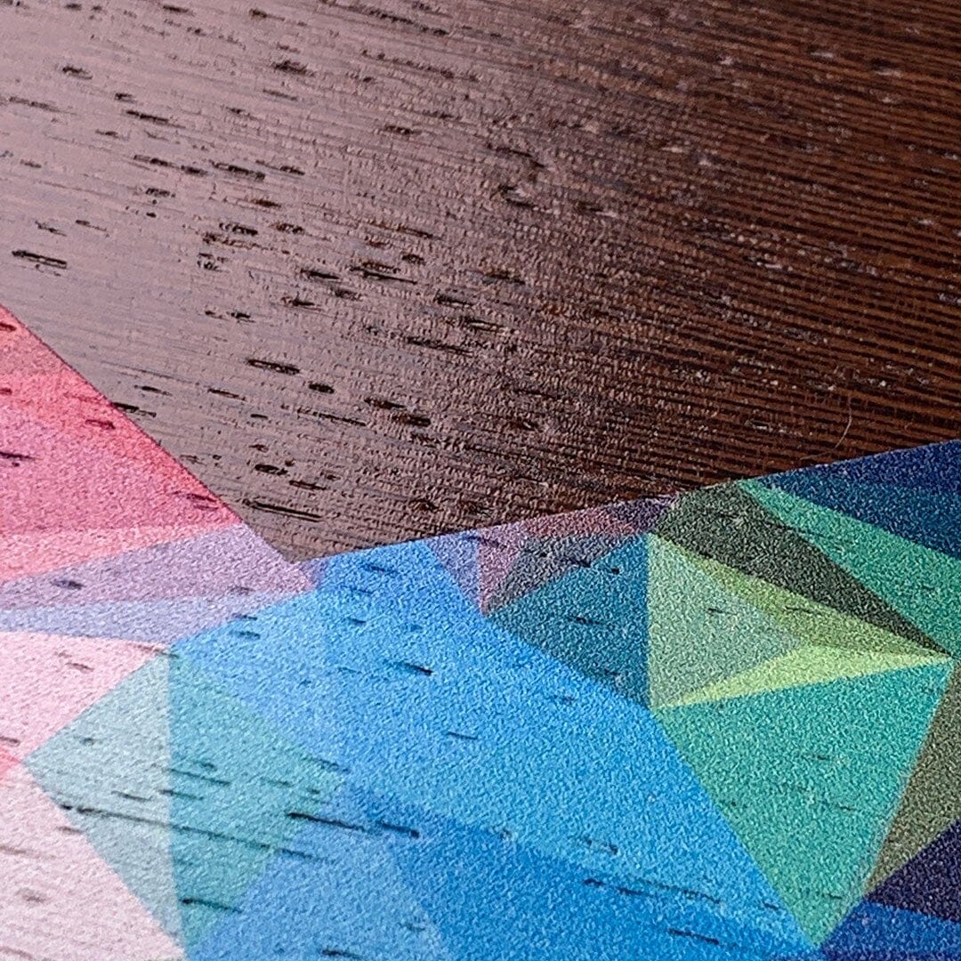 Zoomed in detailed shot of the vibrant Geometric Gradient printed Wenge Wood iPhone 15 Plus MagSafe Case by Keyway Designs