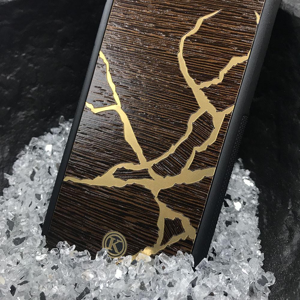 Zoomed in detailed shot of the Kintsugi inspired Gold and Wenge Wood iPhone 12 Mini Case by Keyway Designs