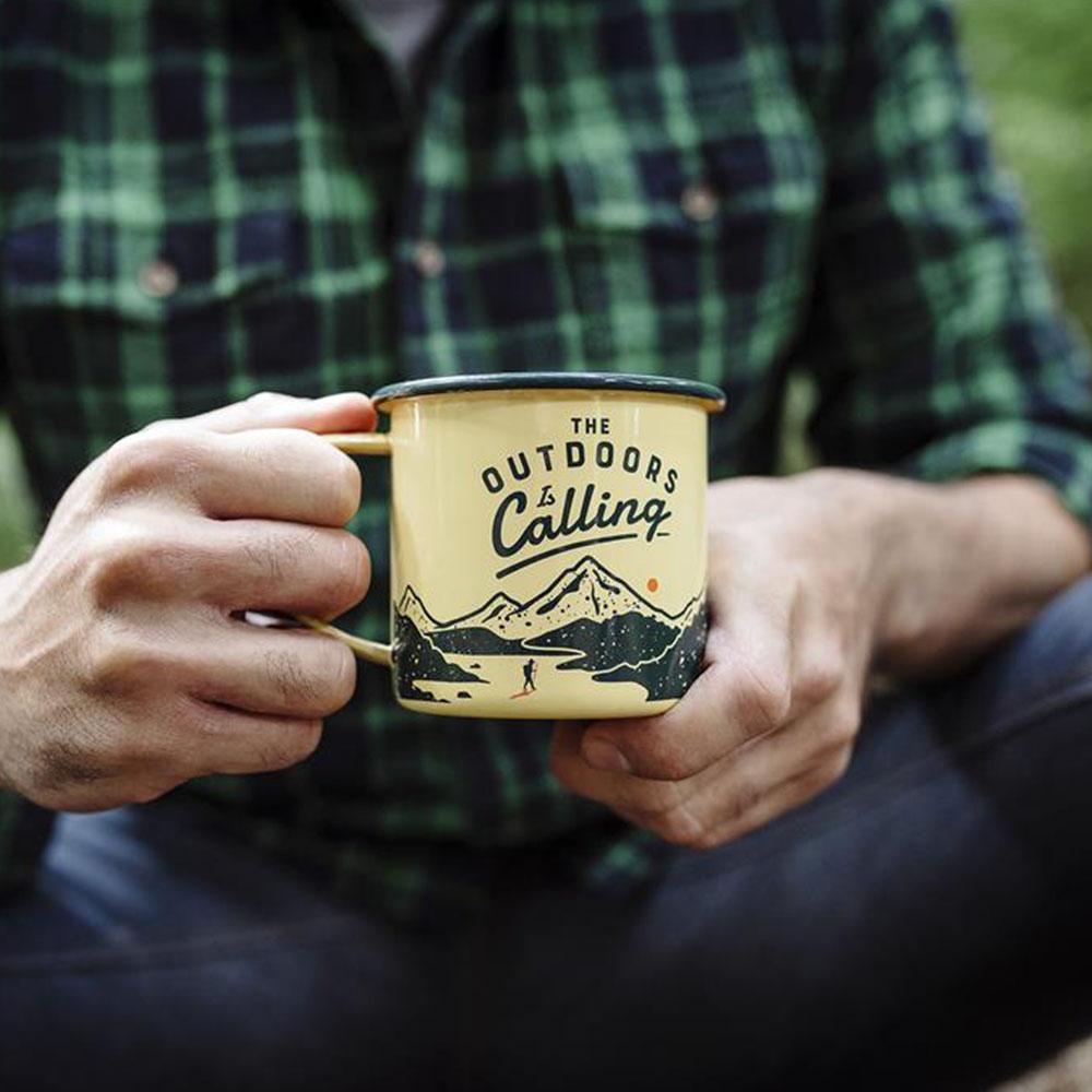 Wild+Wolf - Outdoors is Calling mug by the campsite
