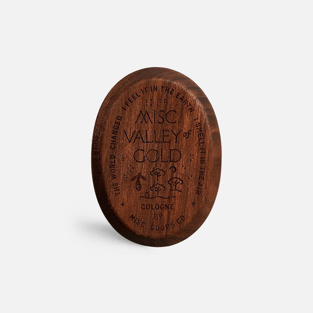 Back engraving of Misc Goods Co. Men's Solid Cologne Valley of Gold in Solid Walnut Case | Keyway