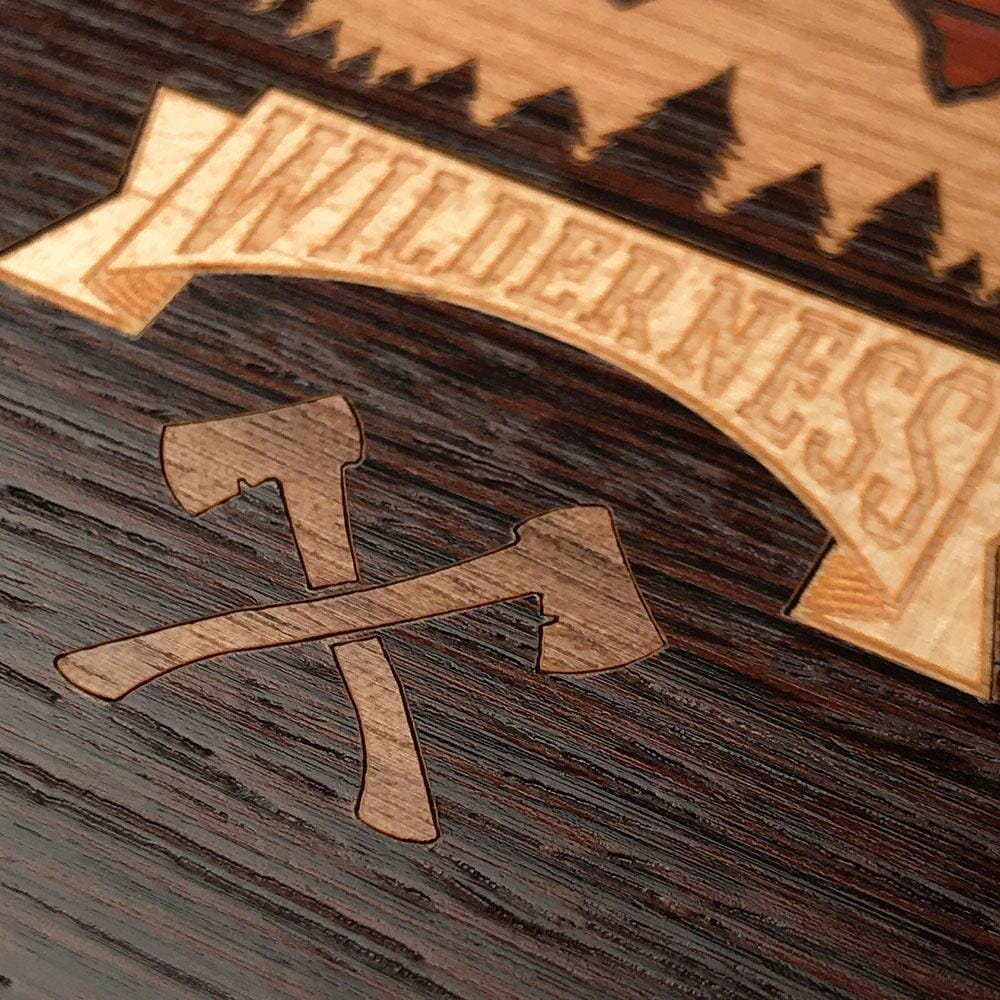 Zoomed in detailed shot of the Wilderness Wenge Wood iPhone 15 MagSafe Case by Keyway Designs