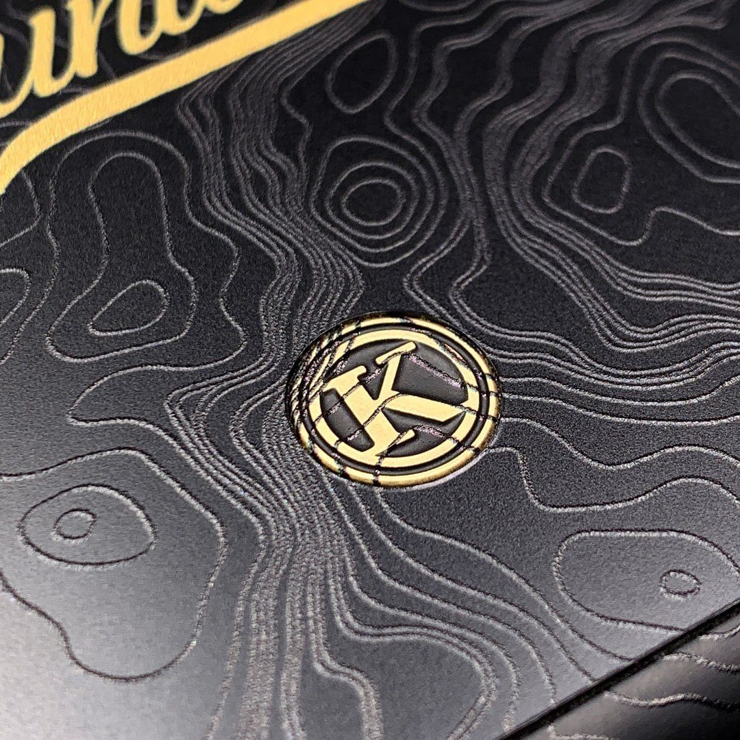 Zoomed in detailed shot of the crisp topographical map with Explorer badge printed on matte black impact acrylic iPhone 7/8 Case by Keyway Designs